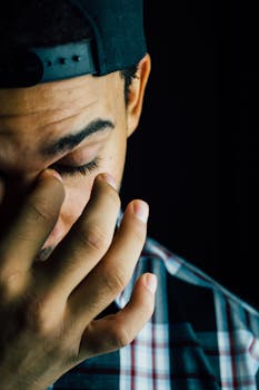 pexels-photo-262218-262218-1 Man Pinching Nose Close-up Photo